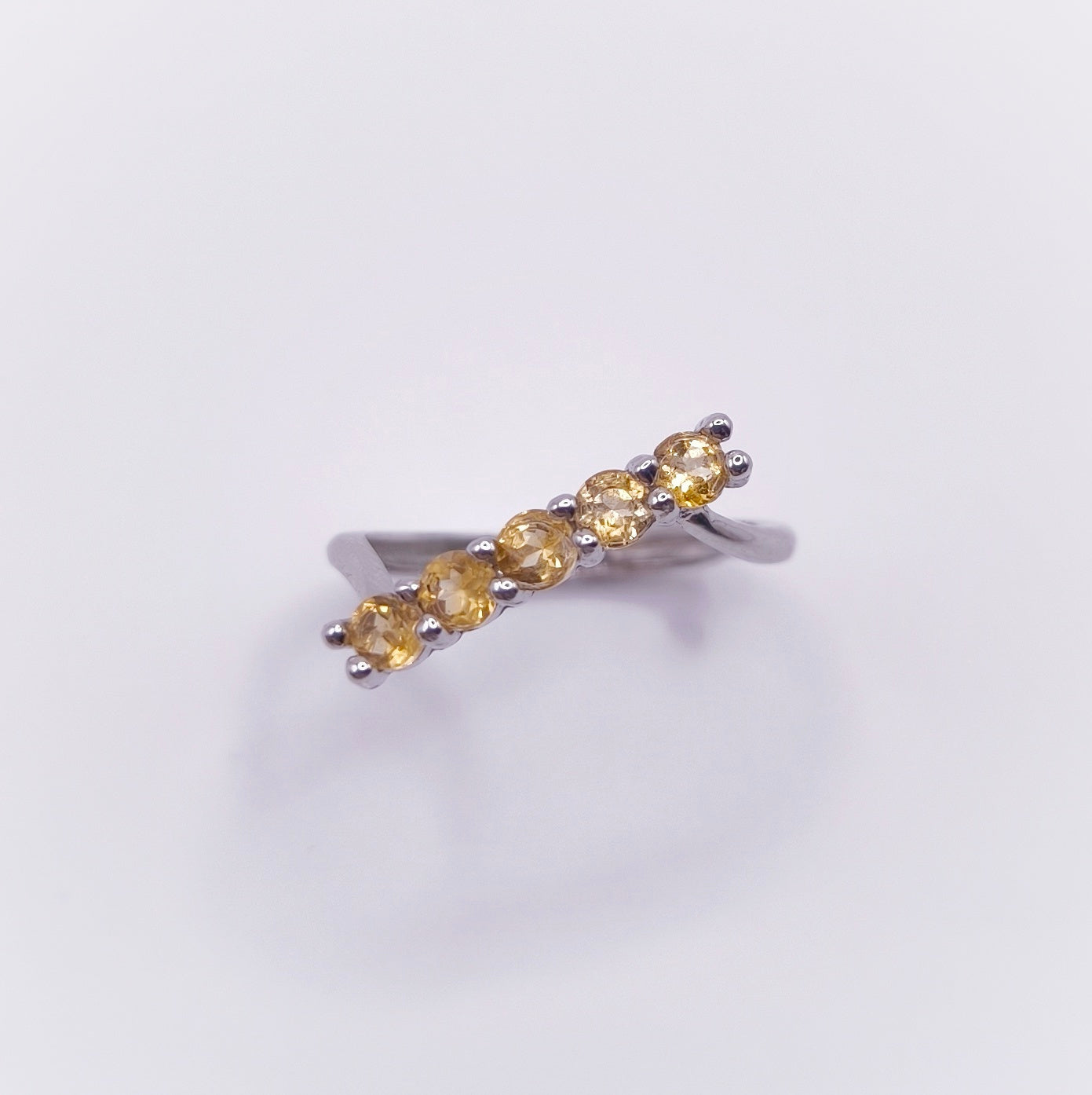 Adjustable citrine ring in 925 sterling silver with 3mm round-cut stones