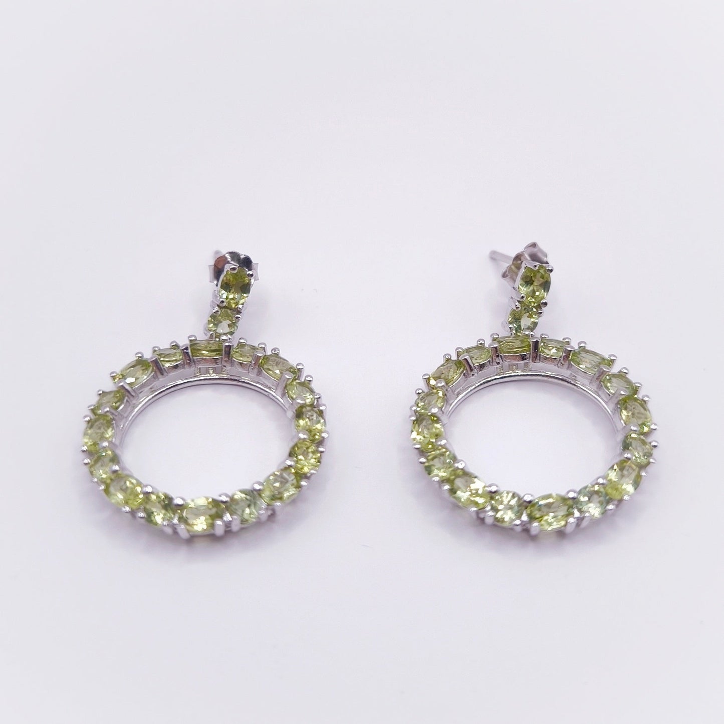 Peridot ear studs with mixed gemstone cuts set in 925 sterling silver