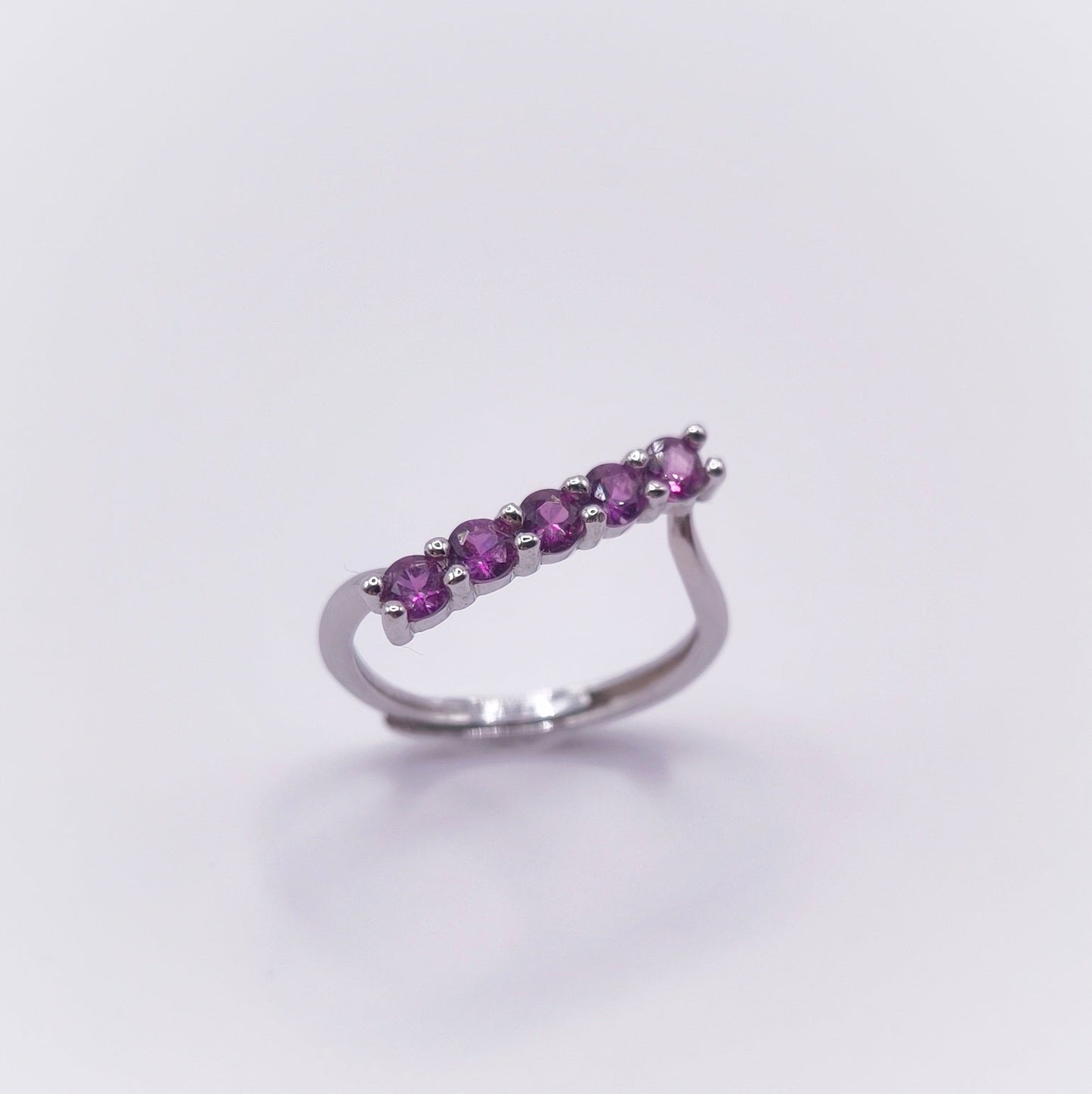 Adjustable amethyst ring with seven 3mm round-cut stones in 925 sterling silver