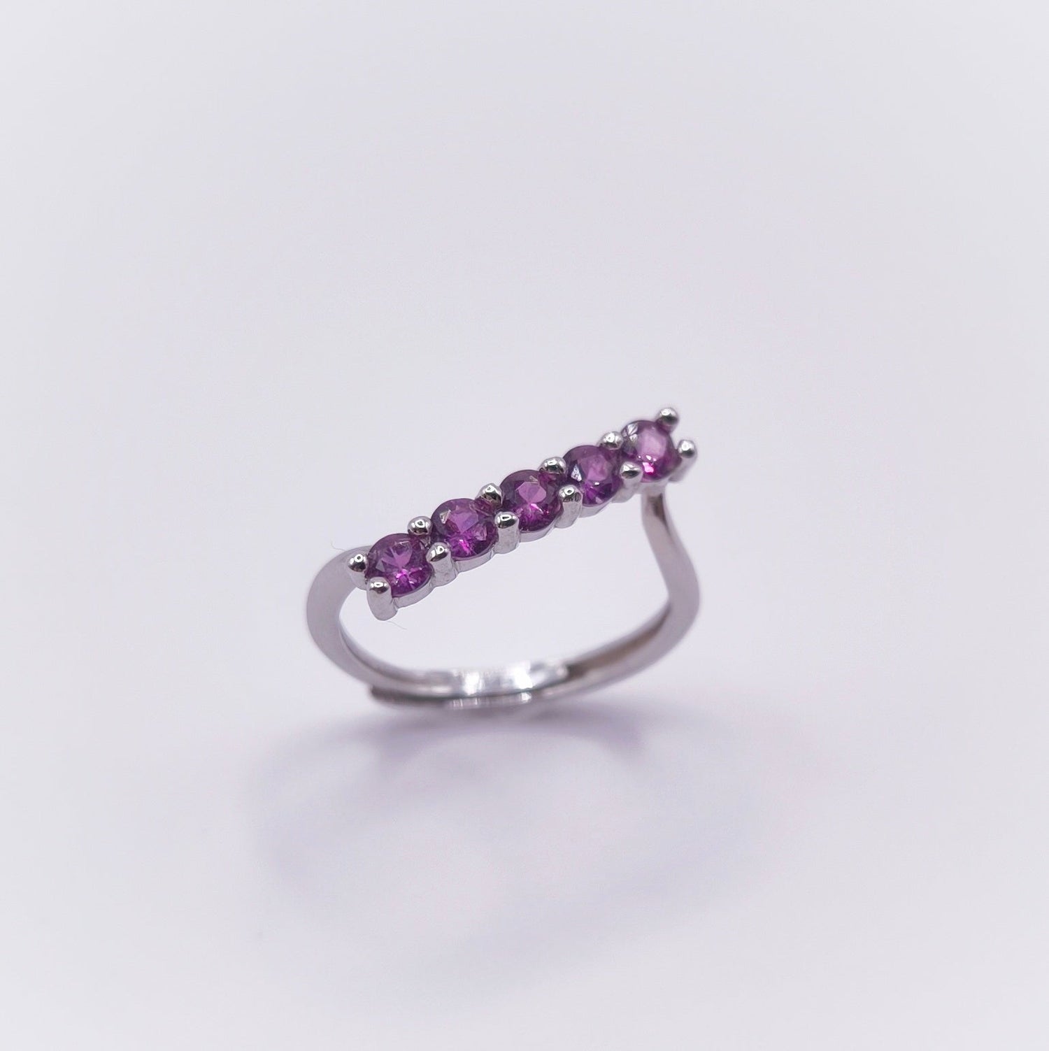 Adjustable amethyst ring with seven 3mm round-cut stones in 925 sterling silver