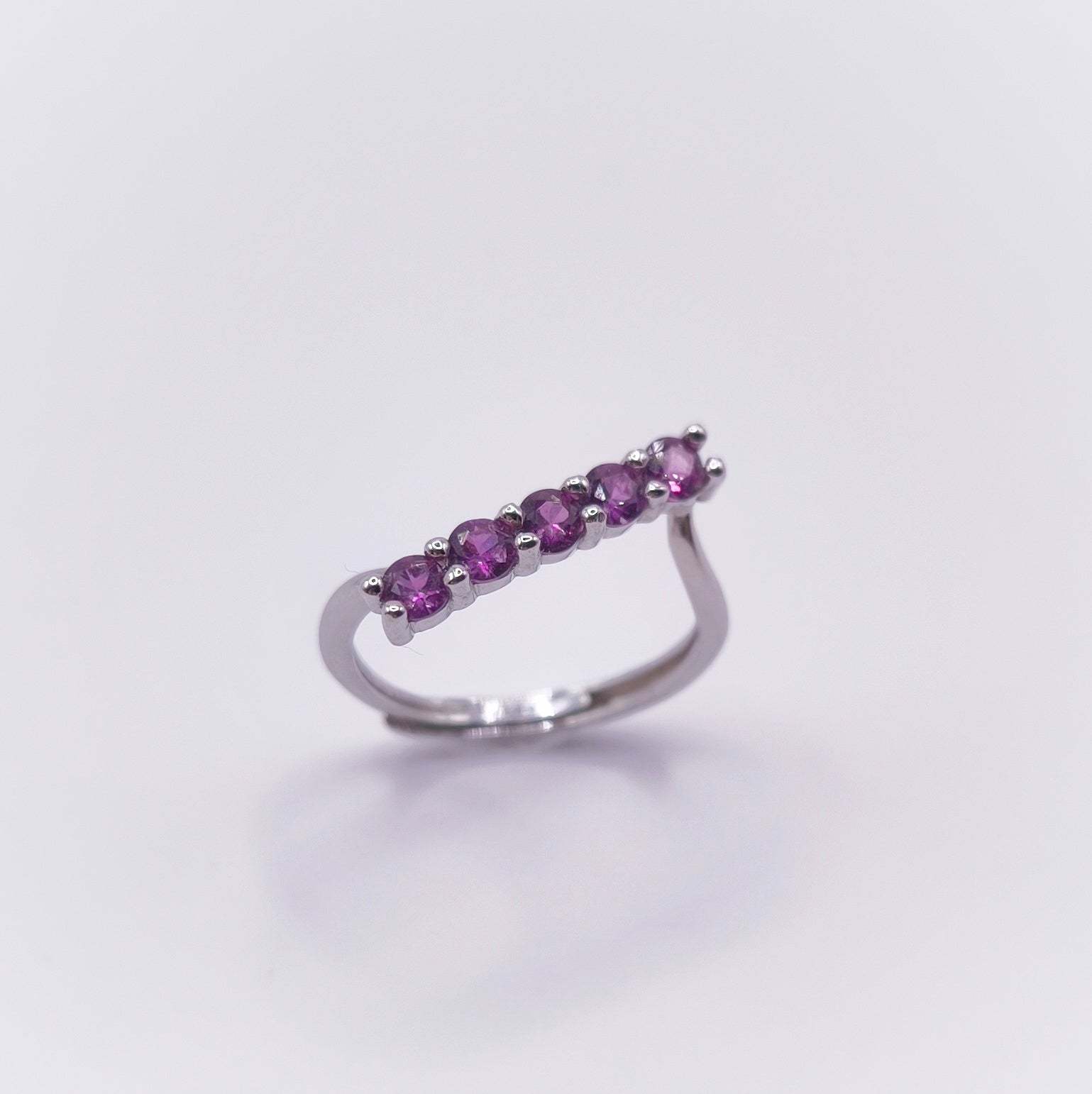Adjustable amethyst ring with seven 3mm round-cut stones in 925 sterling silver