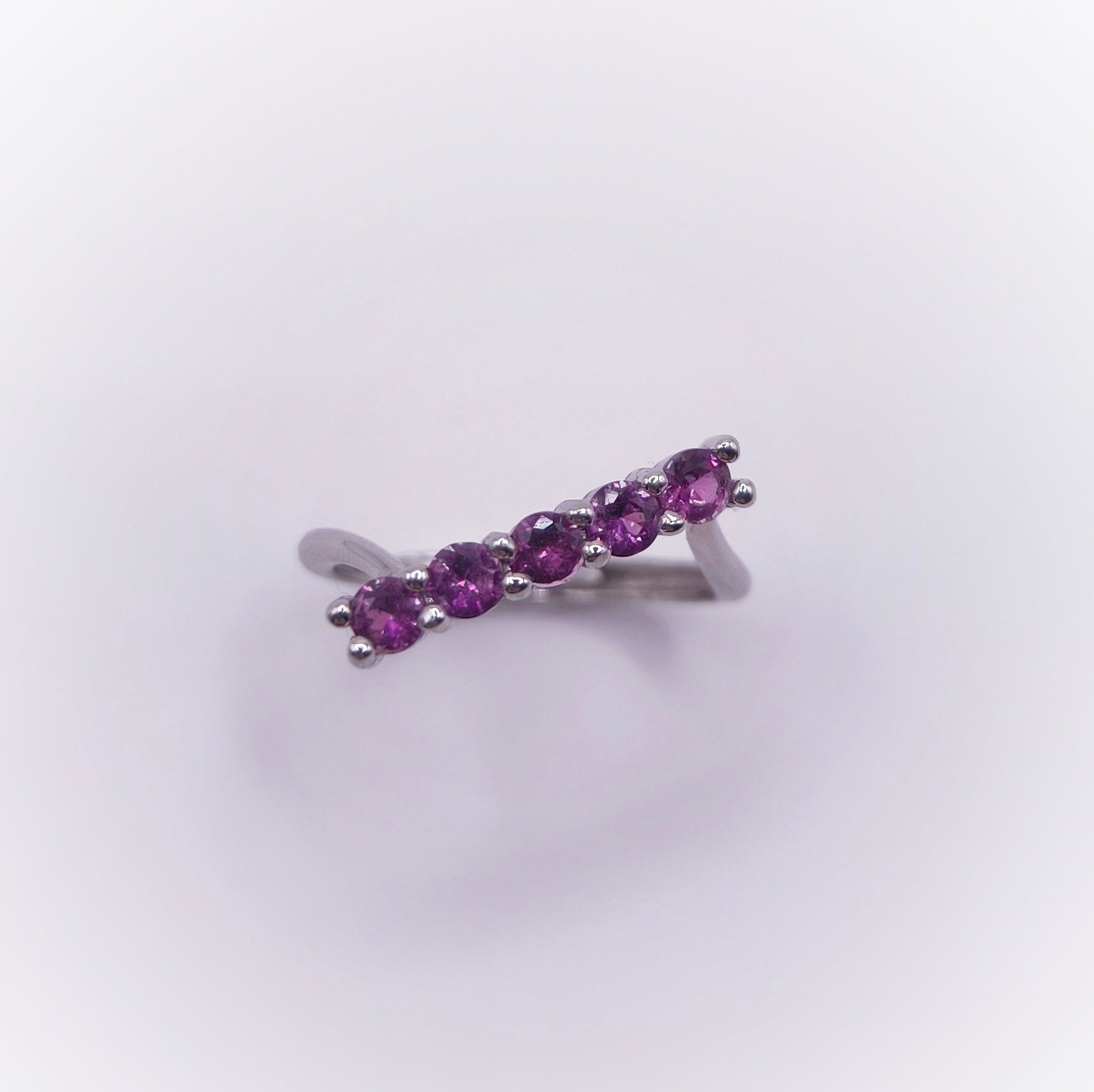 Adjustable amethyst ring with seven 3mm round-cut stones in 925 sterling silver