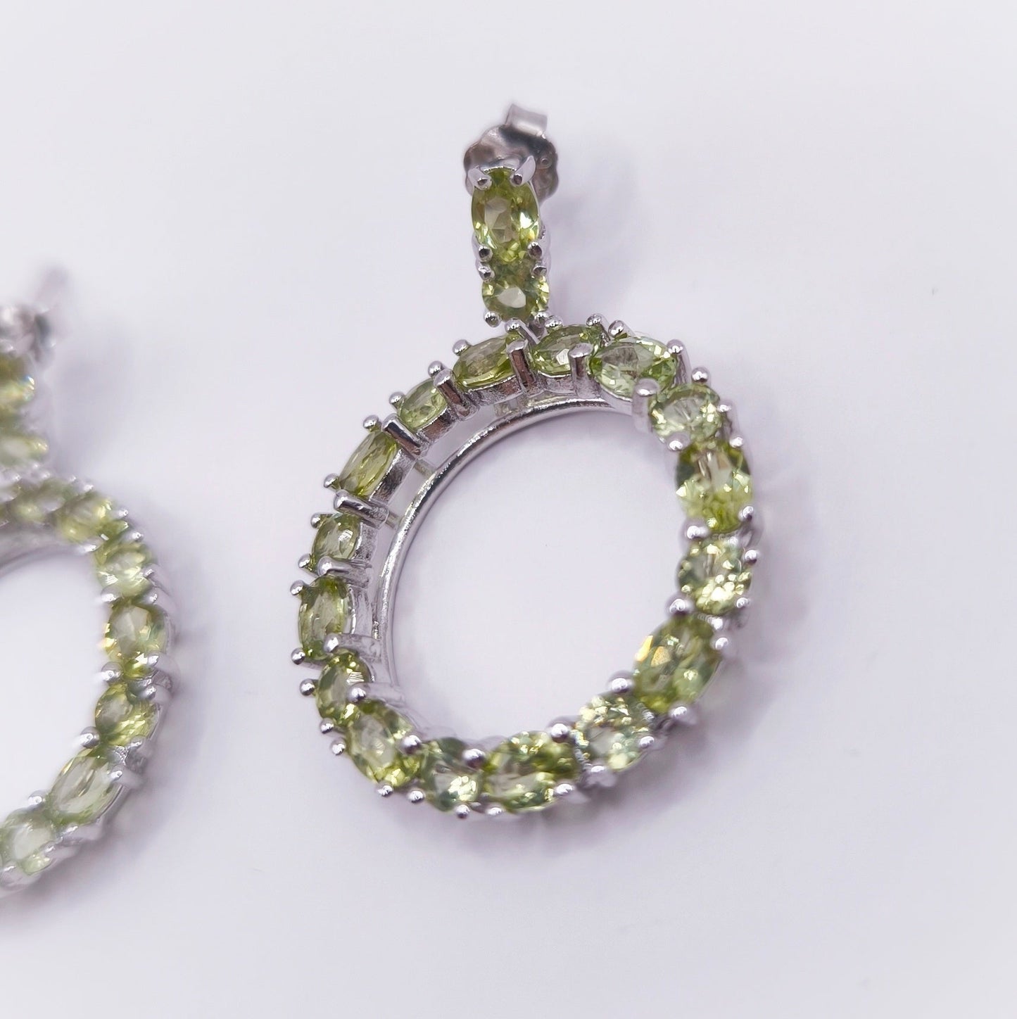 Peridot ear studs with mixed gemstone cuts set in 925 sterling silver